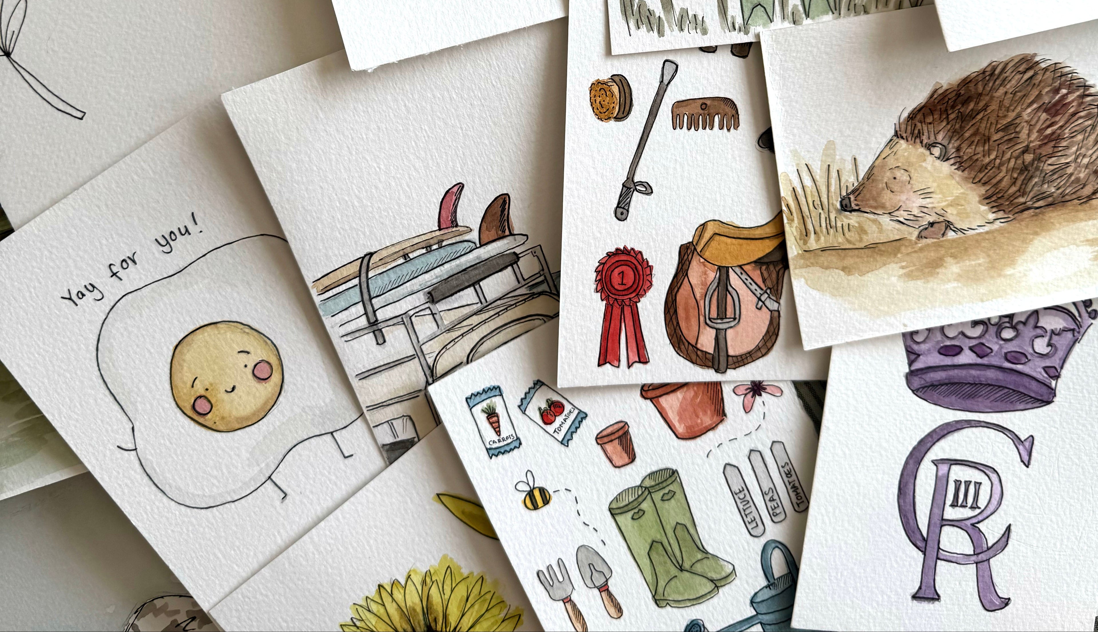 A collage of small illustrated cards or prints arranged on a white surface, featuring hand-drawn scenes and objects including a bouquet of flowers, a person holding a dog, a hedgehog, gardening tools, letters, shells, and handwritten text.
